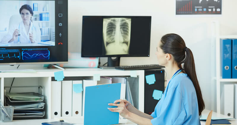 A view of a doctor checking a lungs x ray