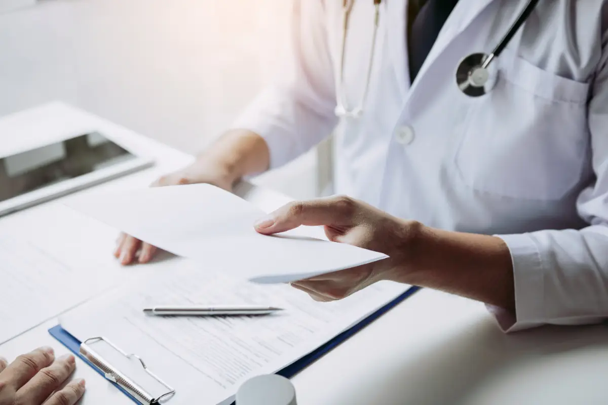 Healthcare worker explaining patient data involving Accounts Receivable Services in California