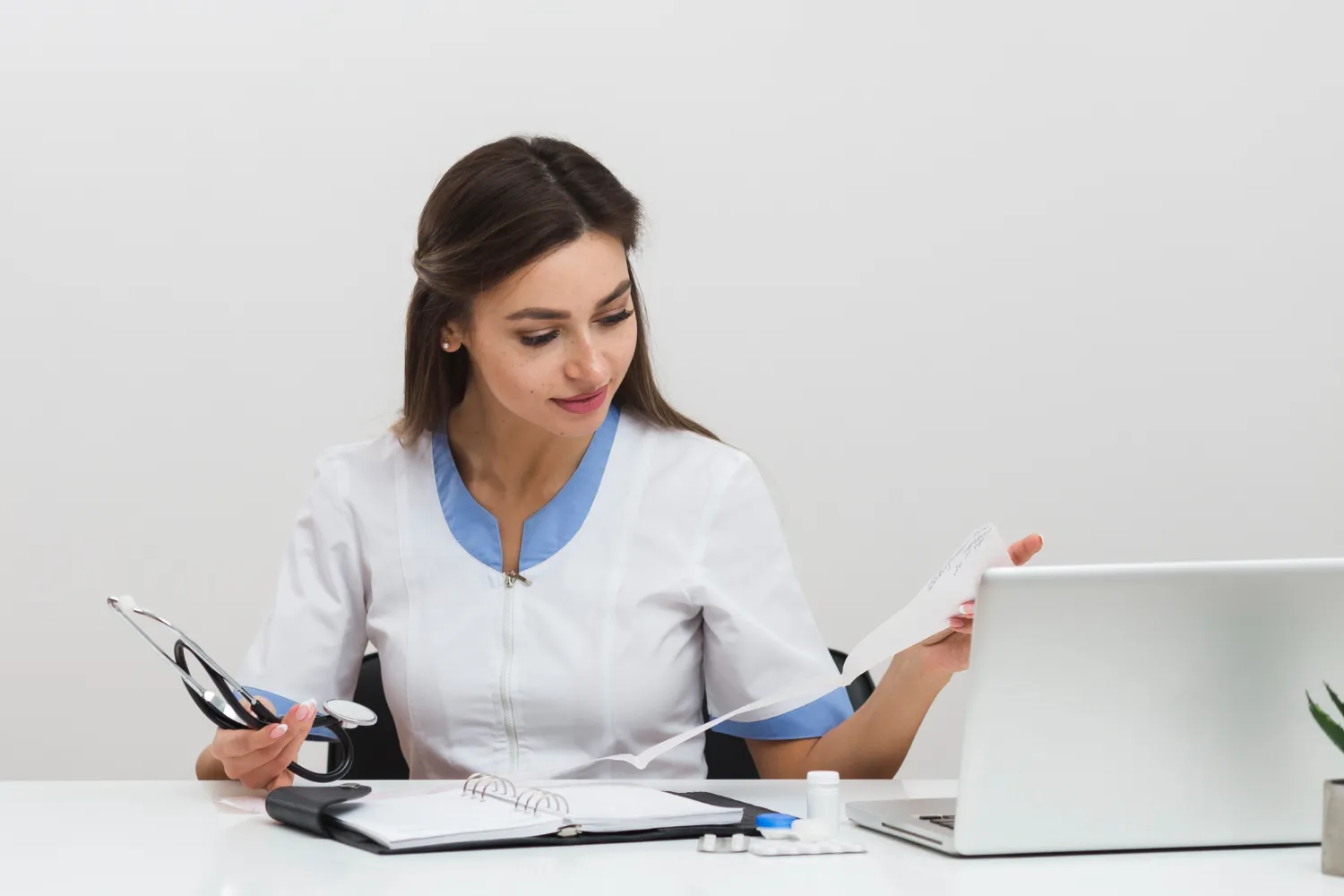 Medical Billing Services in California staff analyzing patient billing reports