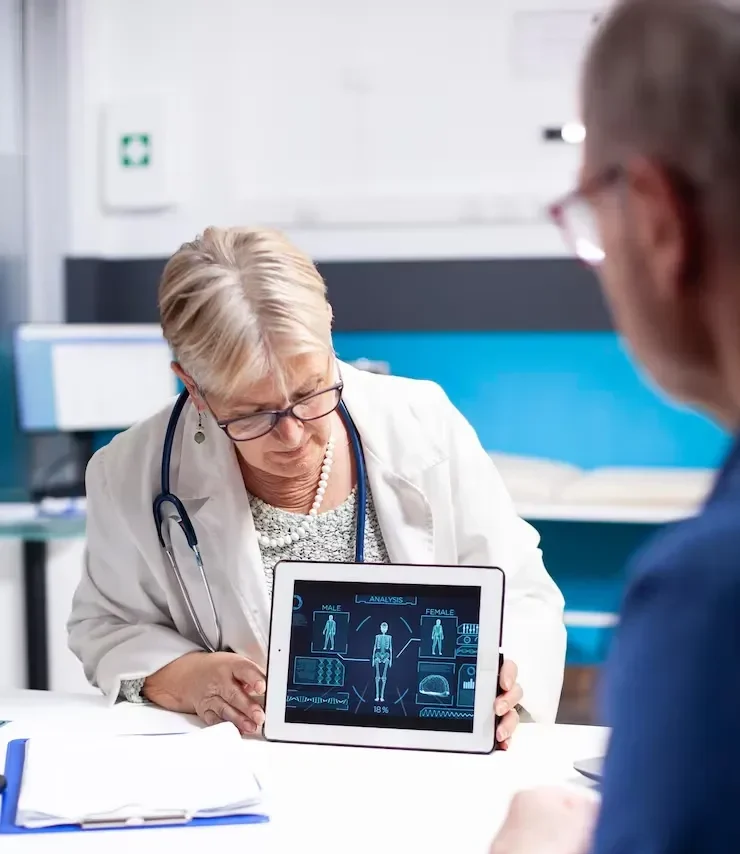 Medical Coding in California specialist presenting patient info on tablet