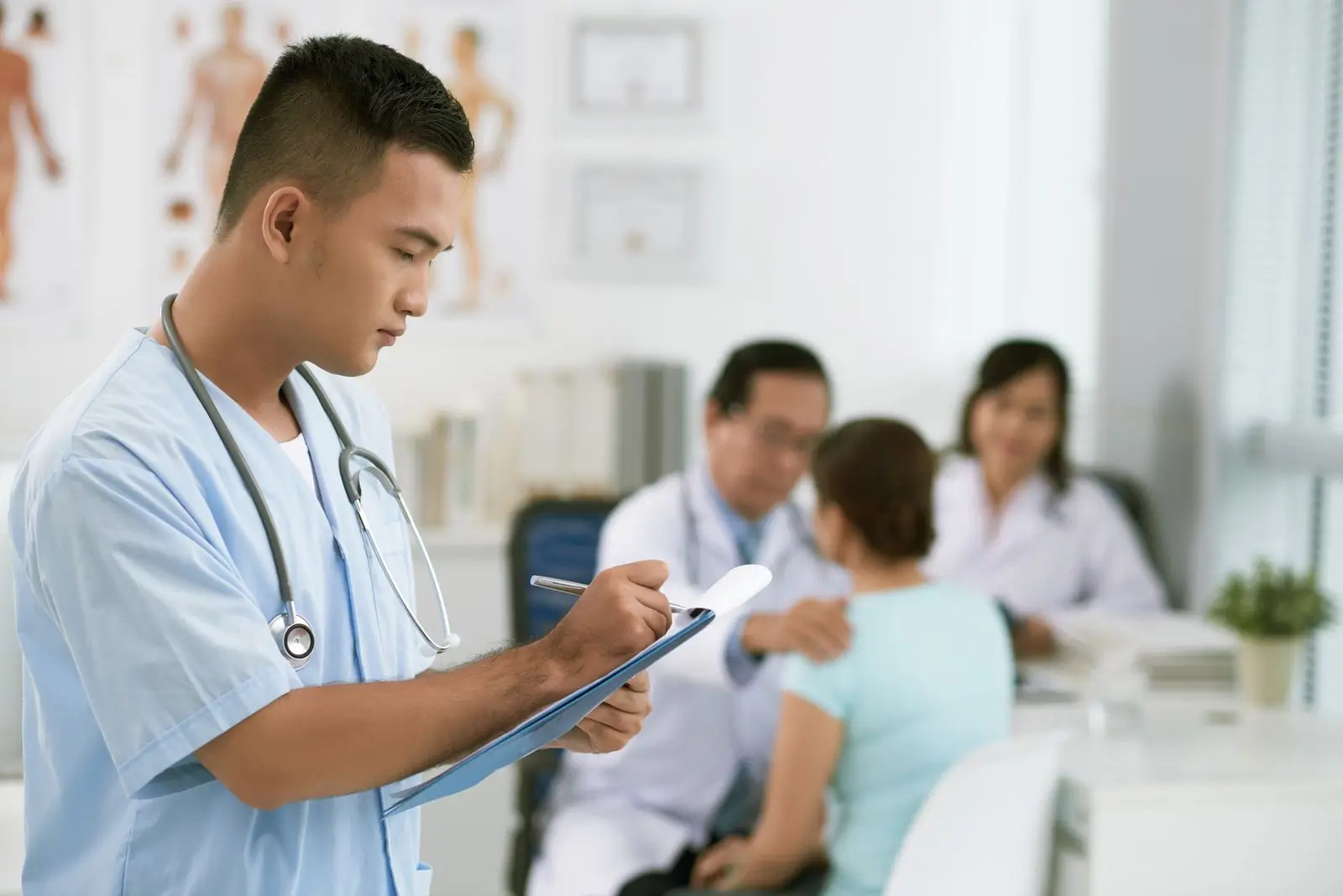 Medical Credentialing Services in California professional completing patient documentation