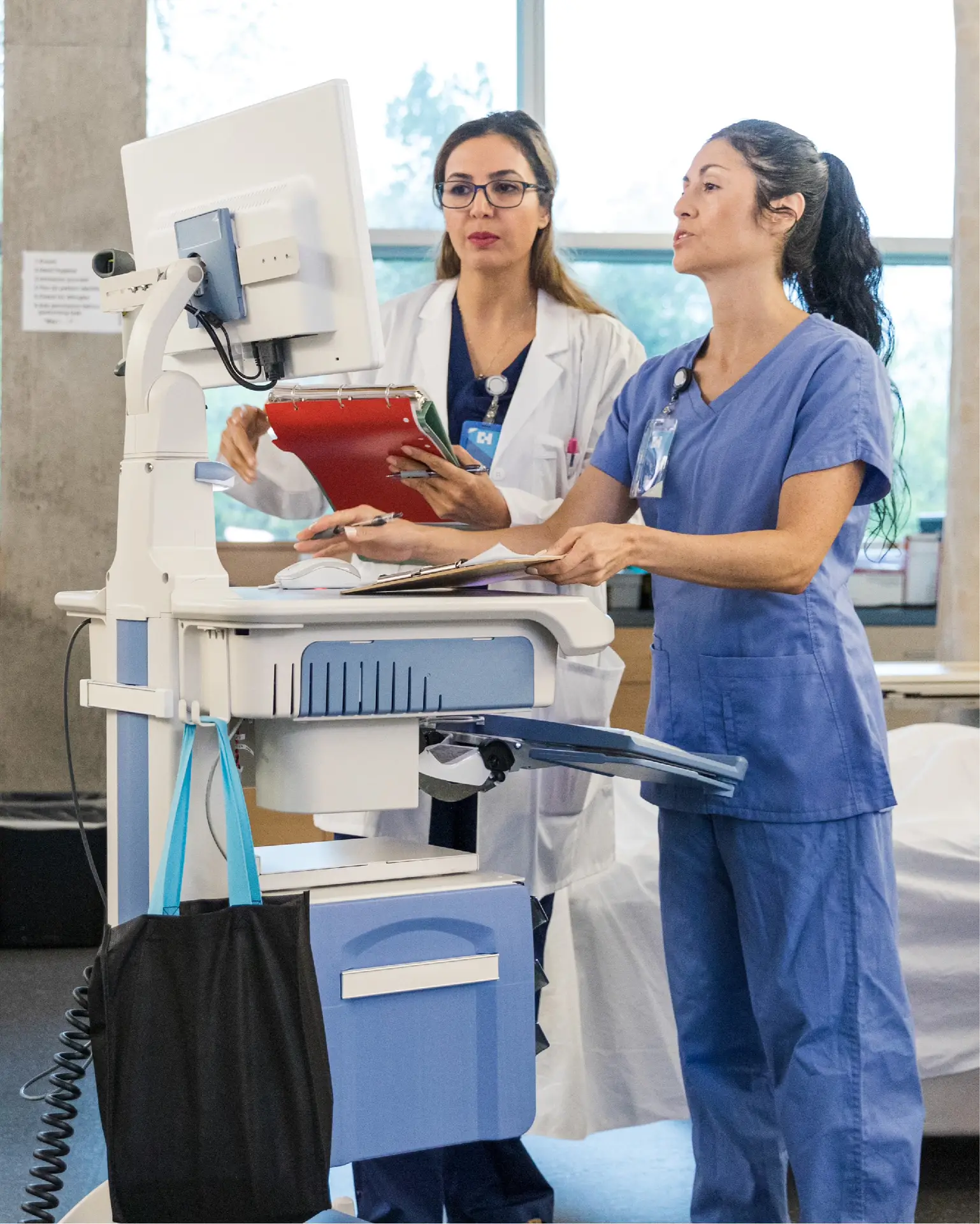 Revenue Cycle Management Services in California team reviewing medical records on computer