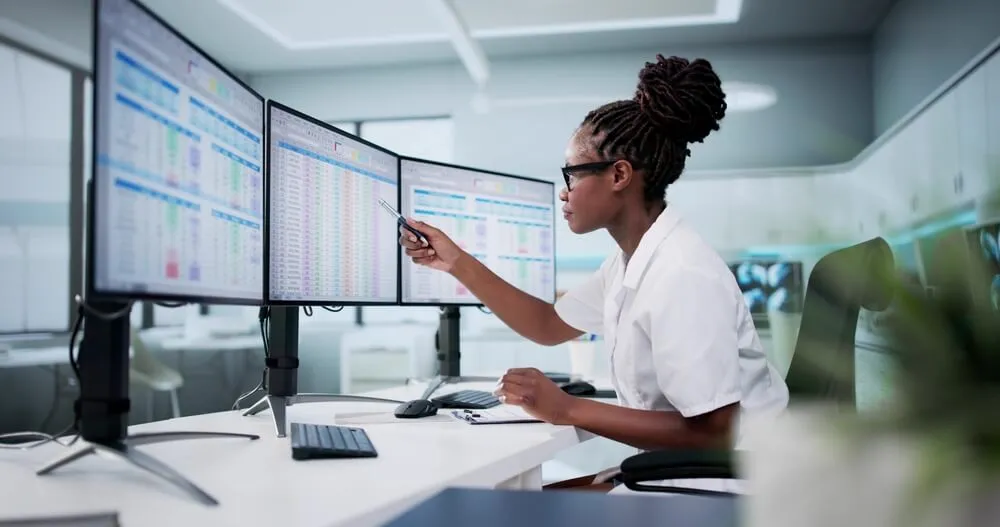 a female healthcare specialist checking claims