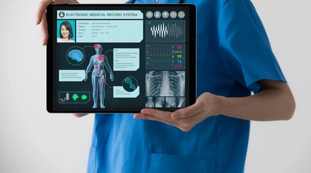 zoomed-view-of-a-person_s-hands-showing-a-tablet-with-health-record-of-a-woman