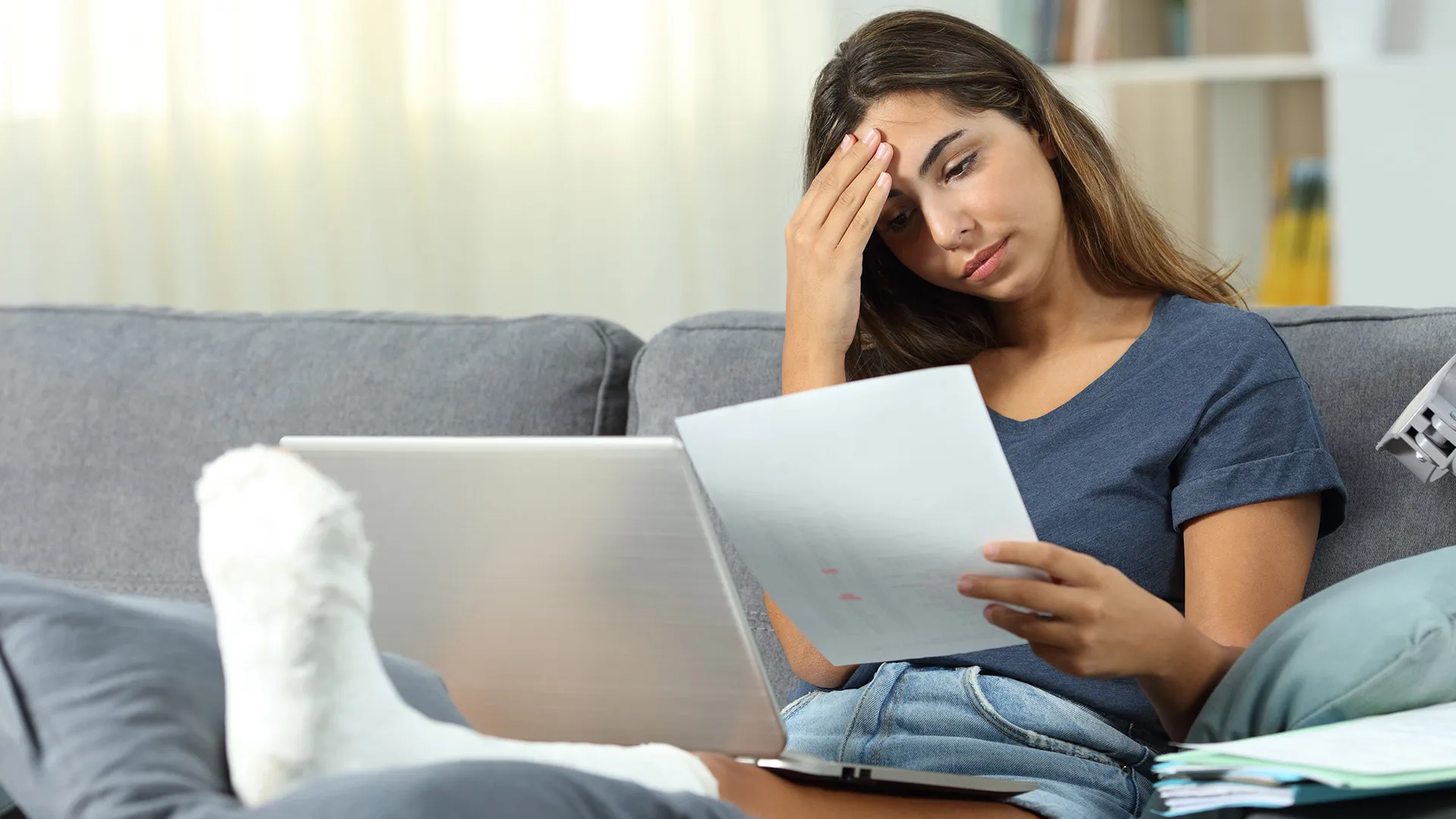 a girl seems frustrated while reading a document